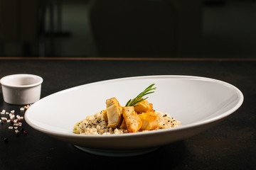 risotto fish (main course rice with seafood) menu concept. food background. copy space. Top view