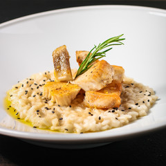 risotto fish (main course rice with seafood) menu concept. food background. copy space. Top view