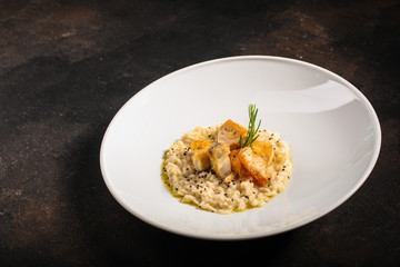 risotto fish (main course rice with seafood) menu concept. food background. copy space. Top view