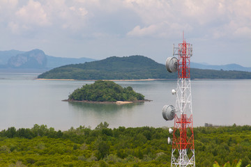 Seaview with various islands, clouds, and satellite tower on the foreground. Koh Phangan island, Thailand