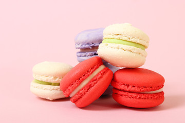 macaroon cakes on a colored background.