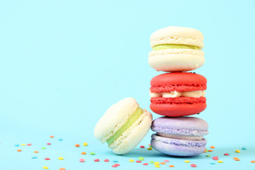 macaroon cakes on a colored background.