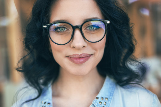 Young woman in stylish glasses