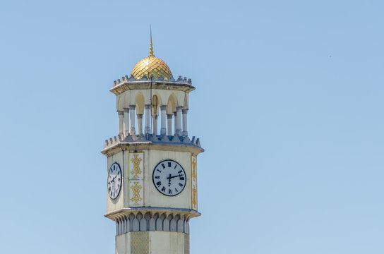 Chachi tower in Batumi, Georgia. Clock tower building close-up against the blue sky
