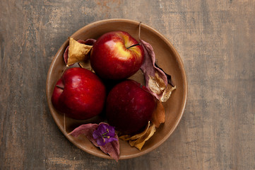 Apples.Autumn fruit.Decorating.Wood color background.View from above.Top.