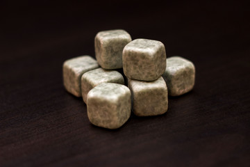 A glass of whiskey with chilled stones. Gentleman's Drink