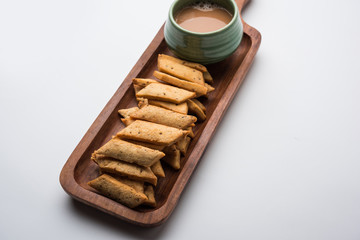 Namakpare or Salty Shakarpara/shakarpare or namkeen Shankarpali, popular diwali food or tea-time snack from Gujarat, India