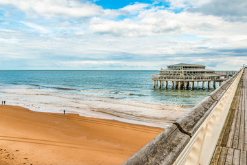Pier on the beach of Scheveningen, North Sea, Holland, Netherlands.