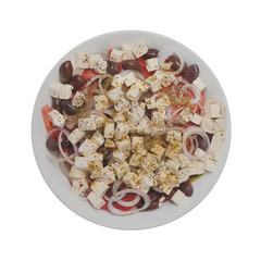 Top view of a large round plate of greek salad.  Isolated on white background.