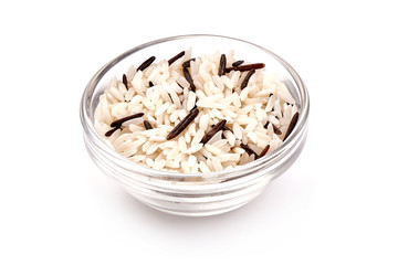 Long grain rice and wild rice mix in a bowl, isolated on white background