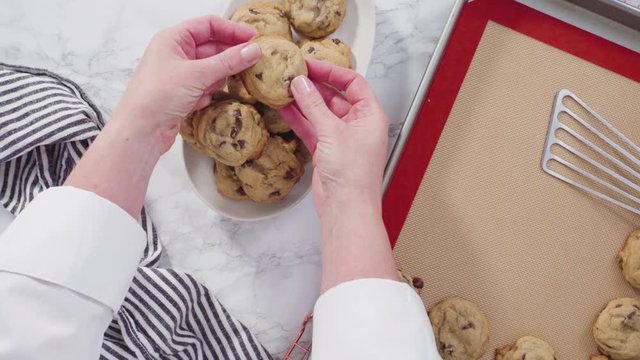 Step by step. Flat lay. Freshly baked homemade soft chocolate chip cookies on a baking sheet.
