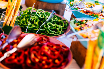 Close up of coloured beautiful healthy food on the table -concept of party and catering or restaurant with vegetarian ingredients - vitamin and. vegetables to eat for wellness and diet