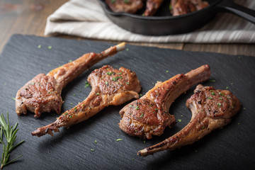 grilled lamb chop on black stone plate © ahirao