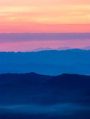 Fototapeta na wymiar Por do sol Camadas de Montanhas Campos do Quiriri