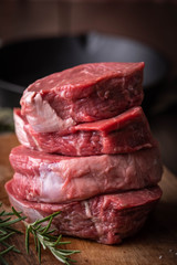 stack of raw beef tenderloin steak