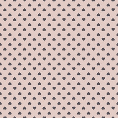 Gray heart printed on light pink background