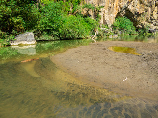 View of the Pellicone Lake and Cascade in Vulci, Italy