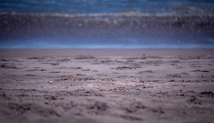 waves and sand texture on the beach