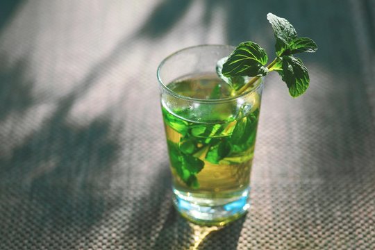 glass of water with ice and mint
