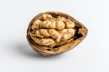 Fototapeta na wymiar Half of cracked walnut isolated on white, top view
