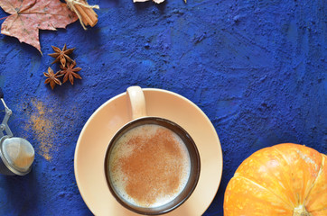 coffee cookies and spices on dark blue background. stylish winter or autumn flat lay. space for text. cozy mood autumn. seasonal holidays concept. blogger.