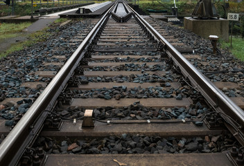 Railroad track vanishing in the distance
