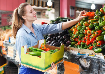 Woman with vegetarian box in market