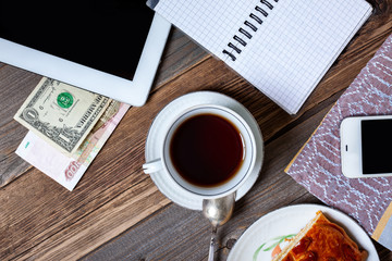 Still life with coffee or tea, cake and gadgets