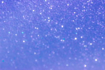 Defocused abstract blue shiny background.