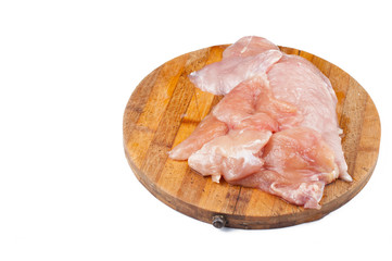 Chicken steak on wooden cutting board isolated on white background