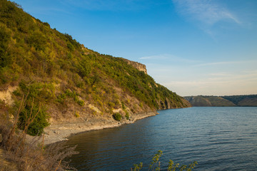 European summer nature scenery landscape wallpaper photography with lake smooth water surface and green mountains and hills of reservation environment