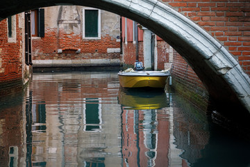 Beautiful canals of Venice with old buildings and boats. Venice, Italy.