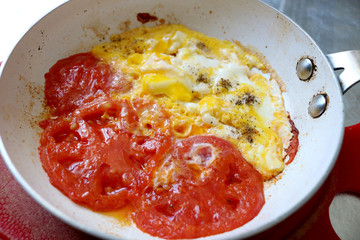 Traditional  food menemen made by eggs and tomatoes. 