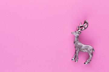 Christmas reindeer on pastel color background. Christmas or New Year minimal concept.