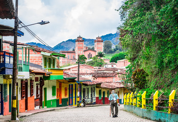 Old man in the streets of colonial village in the center of Jerico, Colombia