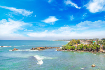 Beautiful view of the tropical beach of Sri Lanka on a sunny day