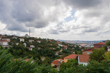 Fototapeta na wymiar View of old houses from Beykoz. Cloudy sky