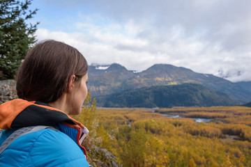 Woman looking at Resurrection River Valley at Exit Glacier, Harding Icefield, Kenai Fjords National Park, Seward, Alaska, United States