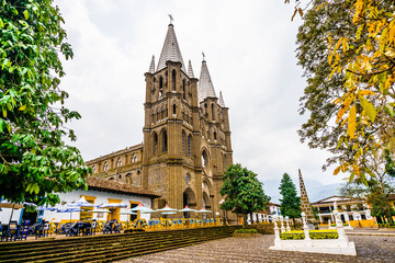 View on church and main square in colonial city El Jardin, Colombia, South America