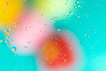 Abstract background, colorful gradient colors. Oil drops in water.