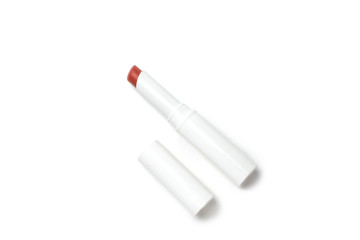 white lip stick colored in red pink purple orange on white background 