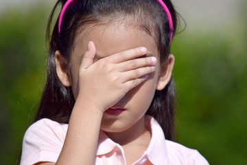 An An Ashamed Female Tween