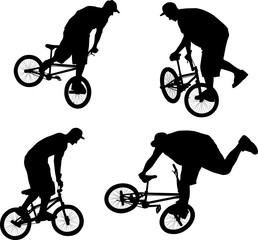 Obraz premium silhouette of cyclist doing bike trick on BMX bicycle