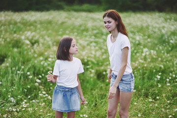 Fototapeta premium mother and daughter in the park