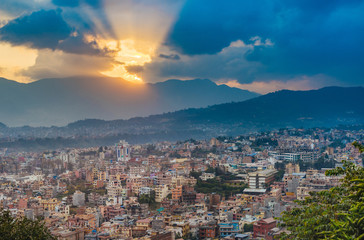 Panoramic view of city buildings in Kathmandu and colourful sunset in capital of Nepal.