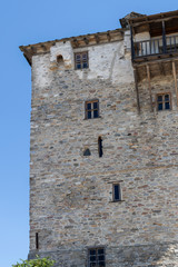Fototapeta na wymiar The old tower in town of Ouranopoli, Greece