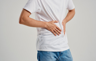 man with pain in his back