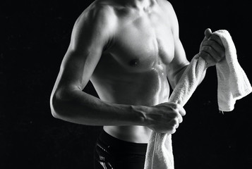 Fototapeta na wymiar Man nude torso workout inflated
