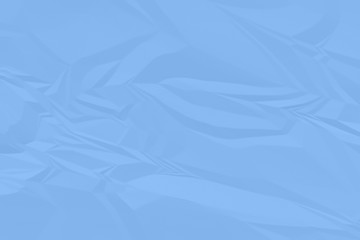 Obraz premium crumpled blue paper background close up