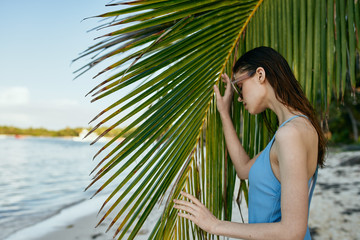 woman in hammock on the beach